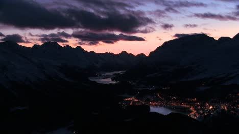 beautiful time lapse shot of sunset behind a mountain town 2