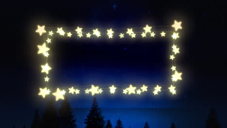 Animation-of-fairy-light-frame-with-copy-space-over-fir-trees-and-winter-scenery