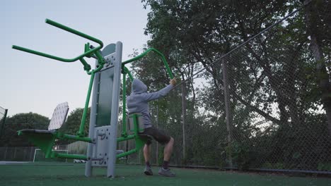 man using a chest press machine