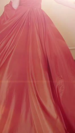 woman in a red ballgown