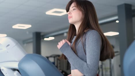 slow motion woman doing cardio on treadmill in gym active lifestyle sport concept slow motion woman doing cardio on treadmill in gym active lifestyle sport concept