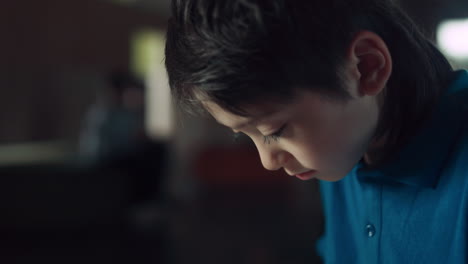 Schoolboy-surfing-social-media-communicating-with-friends-using-tablet-close-up.