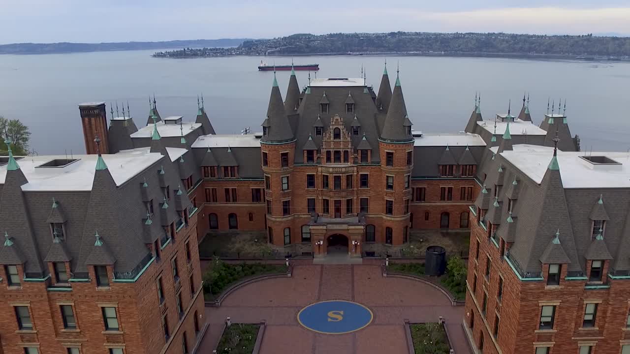 Drone shot of Stadium High School that starts on the Commencement Bay and zooms out to reveal the historic campus.