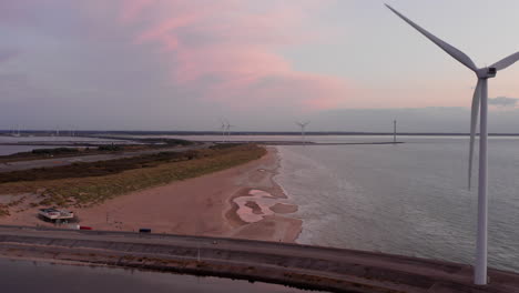 Windturbines-during-sunset-on-the-island-Neeltje-Jans,-the-Netherlands