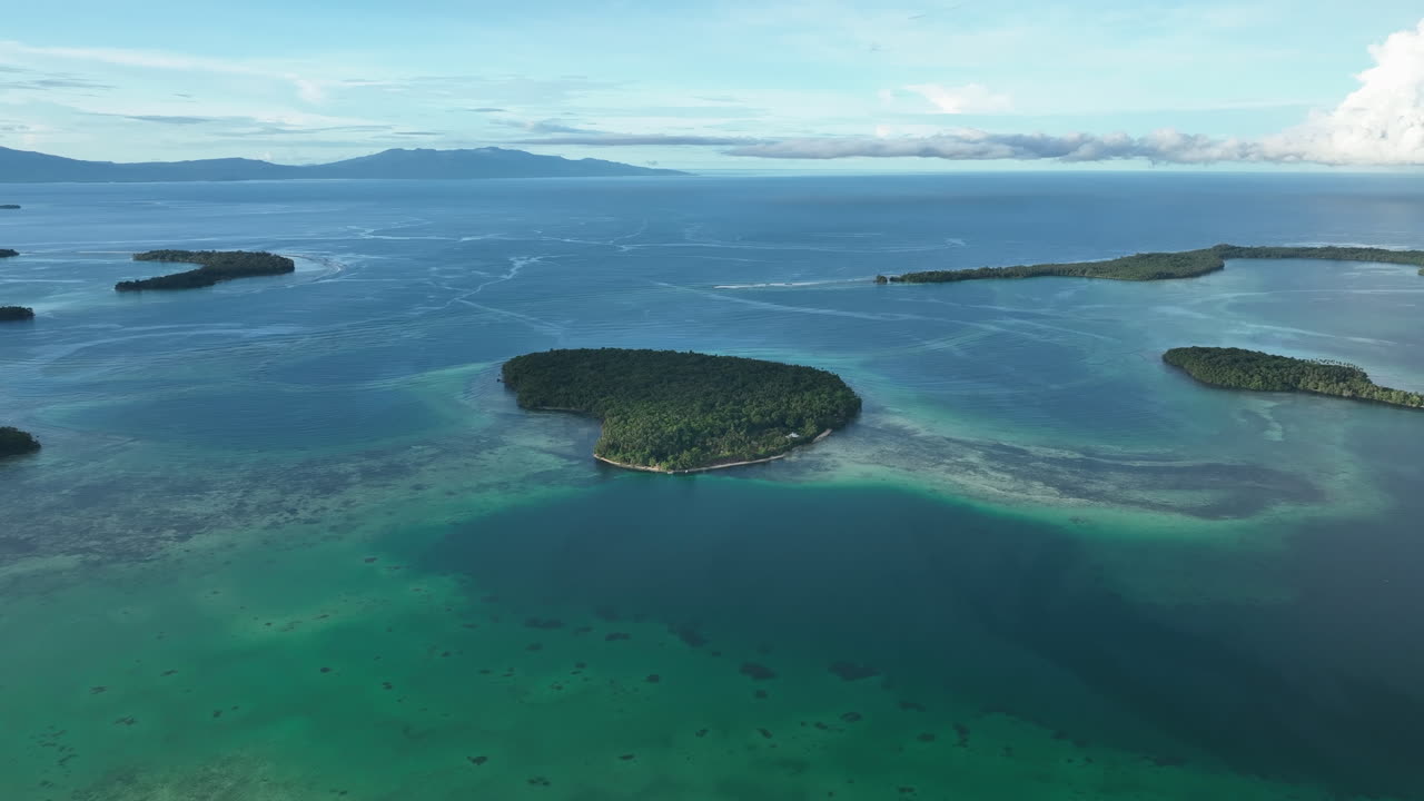 Aerial views over Lola Island at low tide in the Solomon Islands