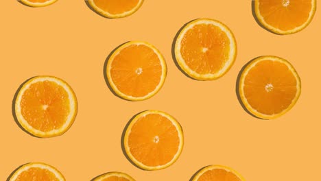 el fondo de las rebanadas de naranja que caen. fruta fresca. bucle. 4k.