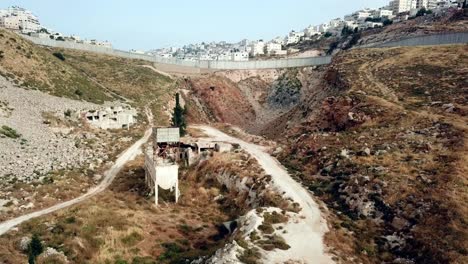 jewish and arab neighborhood split by security wall