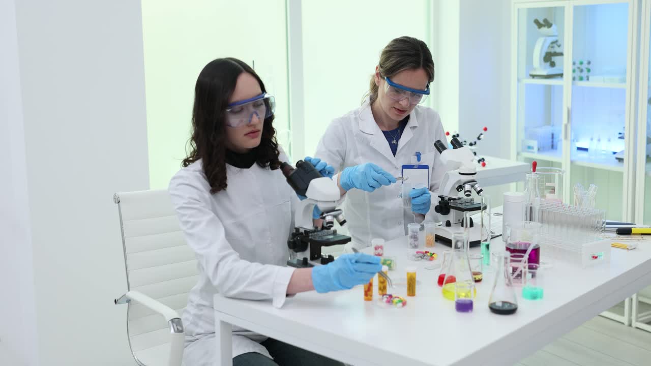 Two female scientists conducting research in a laboratory