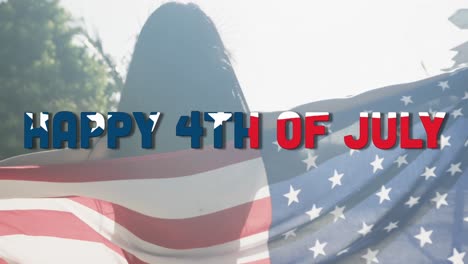 animation of happy 4th of july text and biracial woman dancing with american flag in sun