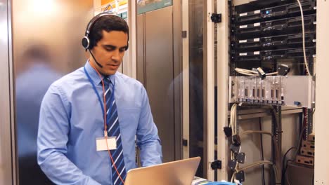 technician talking on head phones