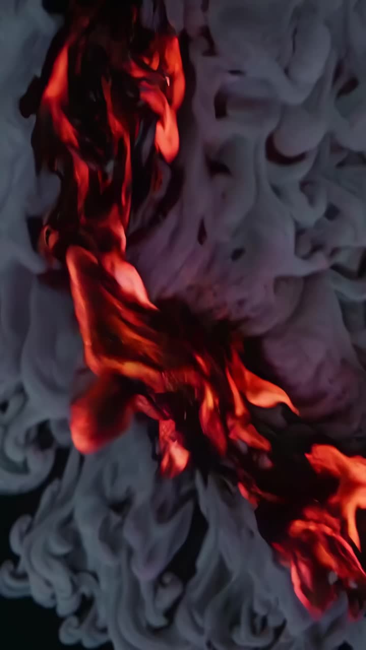 Aerial view of swirling red and white smoke creates a dramatic, abstract effect, perfect