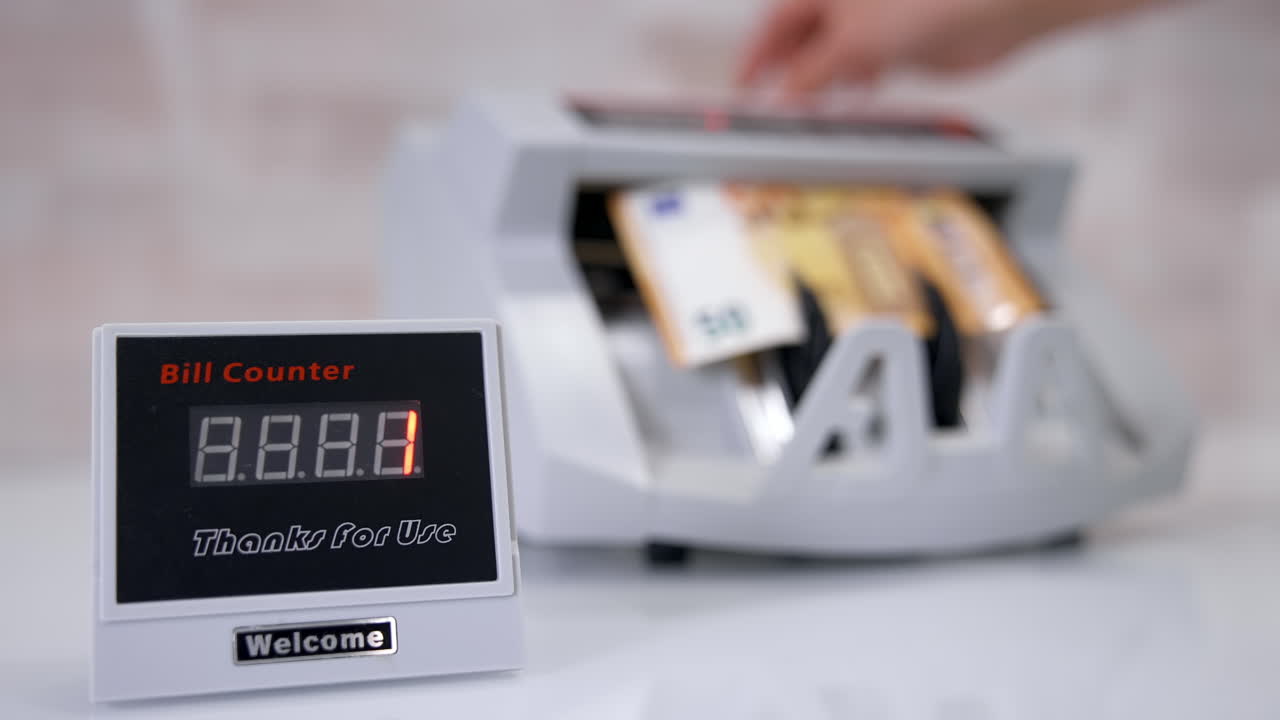 Machine for counting money. Euros banknotes. Finance concept. Mechanism for bank financial operations