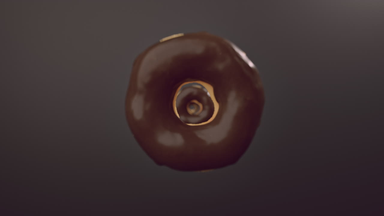 Chocolate glaze donuts on a dark background