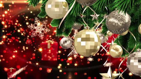 animation of christmas boubles with presents, snow and stars falling over red background