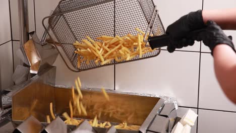 french fries being deep fried