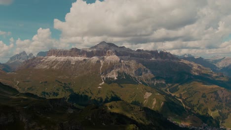 Steep-mountains,-alps-rocks-cliffs-and-open-fields