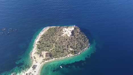 picturesque coastline in albania with a castle on an island along the albanian riviera