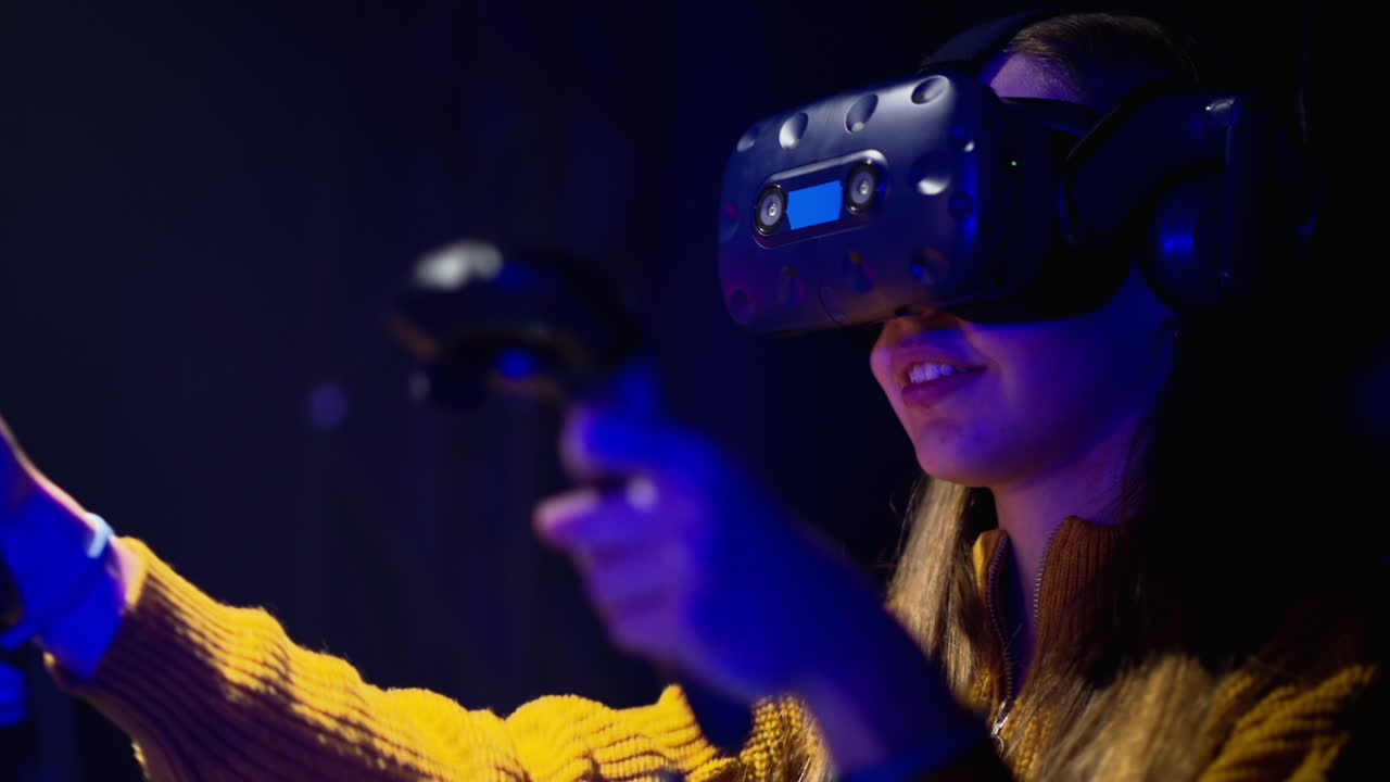 Girl playing with a Virtual Reality headset