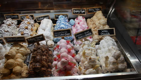 ice cream counter showcase with different varieties of icecream