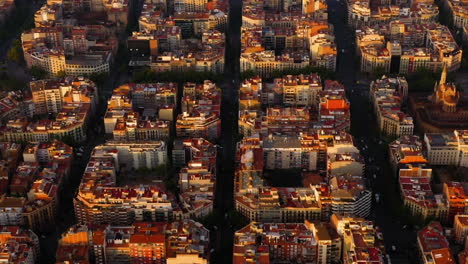 Aerial-view-of-the-whole-city-of-Barcelona-at-sunrise,-Spain