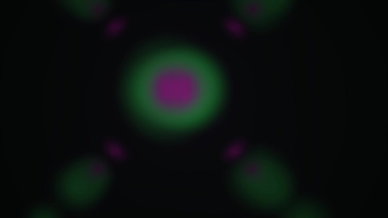 Animazione di un motivo astratto di luci sfocate verdi e magenta