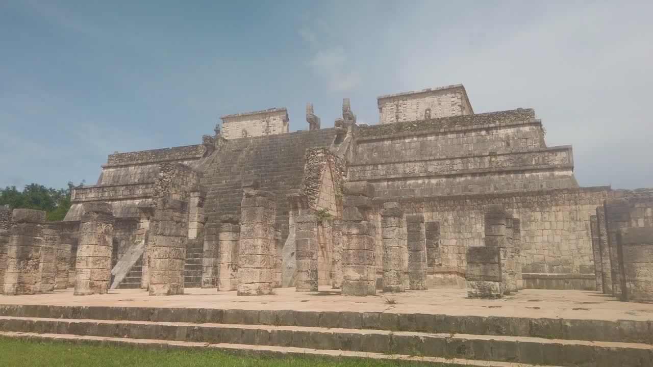 Gimbal wide panning shot of the Temple of the Warriors in Chichen Itza, Mexico. 4K
