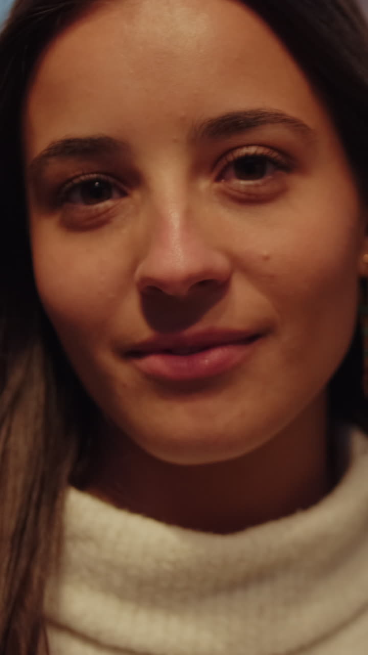 Young Woman Smiles in Seville at Night