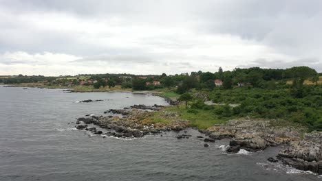 flying over bornholm, denmark island during summer