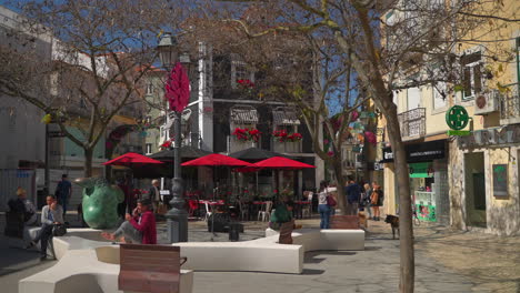 european city square scene with cafe and people