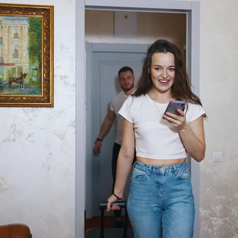 young couple entering hotel room