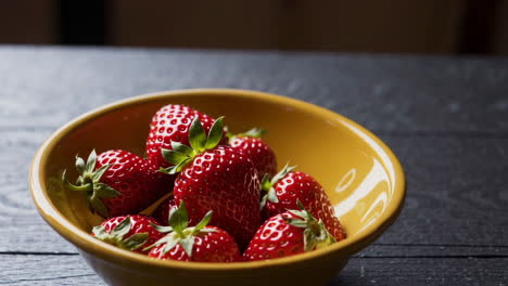 strawberries in a yellow bowl