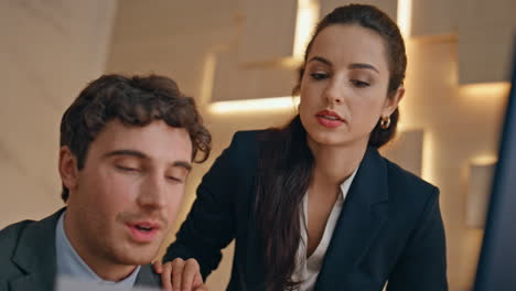 Two partners discussing contract cabinet closeup. Happy managers communicating