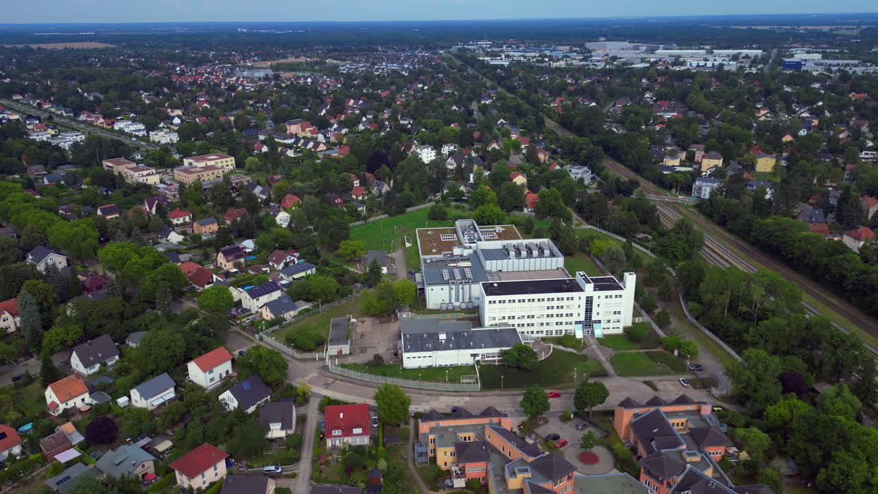datacenter cutting-edge technology and futuristic infrastructure of a large scale data center. Great aerial view flight drone shot from above