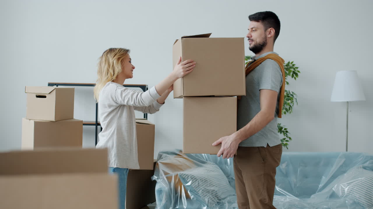 Couple Moving Boxes