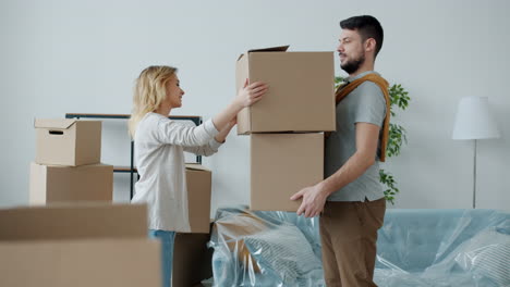 couple moving boxes