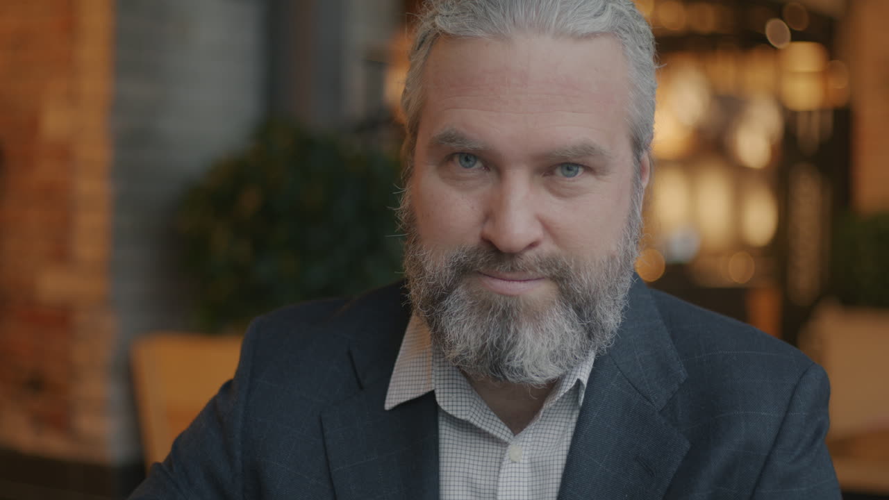 Portrait of a man in a cafe