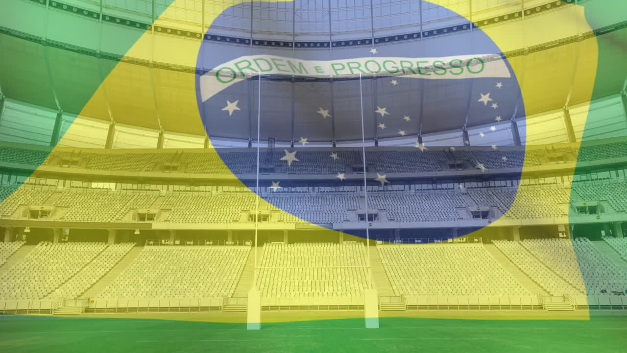 bandera ondeando frente a un estadio