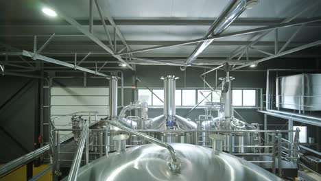 modern craft brewery. craft beer production. modern equipment in brewery, metal tanks, alcoholic drink production