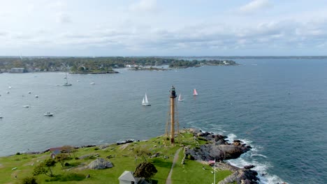 Lighthouse-in-Marblehead-Neck-in-the-Town-of-Marblehead,-Massachusetts,-USA---aerial-drone-shot