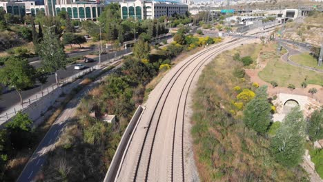 aerial view of train tracks in urban setting