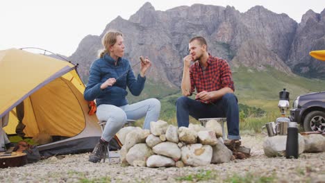 caucasian couple camping in nature