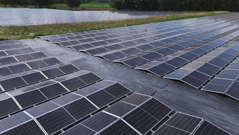Close-up aerial shot of solar panels installed on a rooftop, capturing clean energy from sunlight. Symbol of renewable energy, sustainability, and green technology