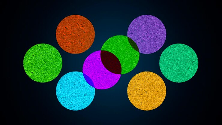 Cerchi di forme multiple, mescolanza di colori diversi, effetto faro, sfondo renderizzato in 3D, generato al computer