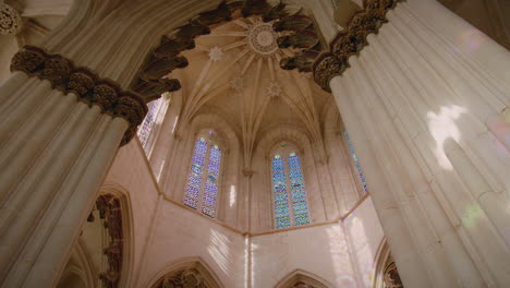 monastery of batalha beautiful gothic dome with stained glass architecture detail in central portugal gimbal shot