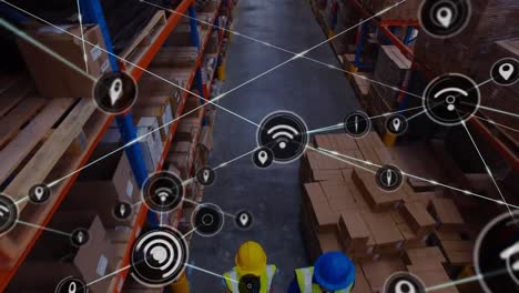 animation of network of connections with icons over african american man working in warehouse