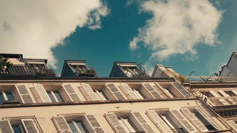 parisian building facade with classic shutters