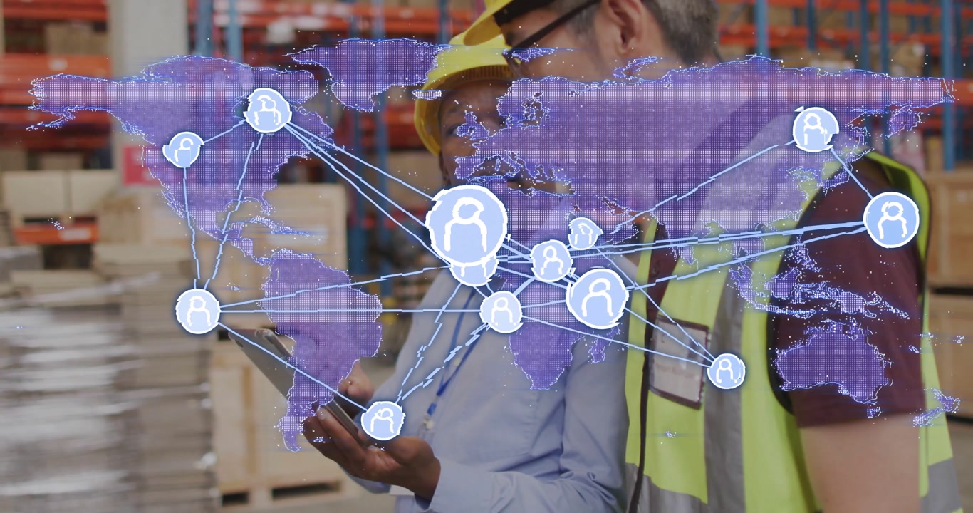 Warehouse crew tapping tablet while monitoring digital global logistics network overlay