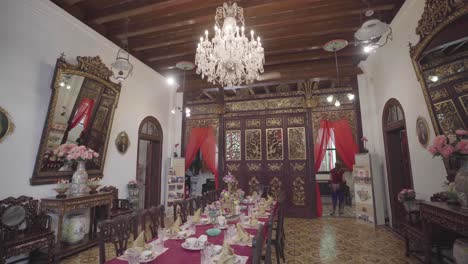 circle pan of authentic asian asian dining room within malaysian museum