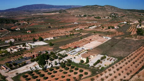 Aerial-pulling-back-from-an-area-in-Els-Purgatés,-Alicante,-Spain