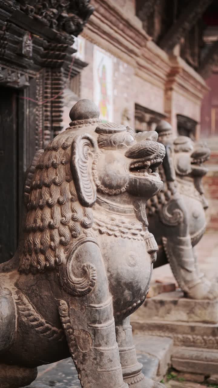 Bhaktapur Stone Statue in a Nepal Temple, Vertical Video for Social Media Instagram Reels and Tiktok Close Up Detail of Statues in Bhaktapur Ancient City Holy and Sacred Religious Place